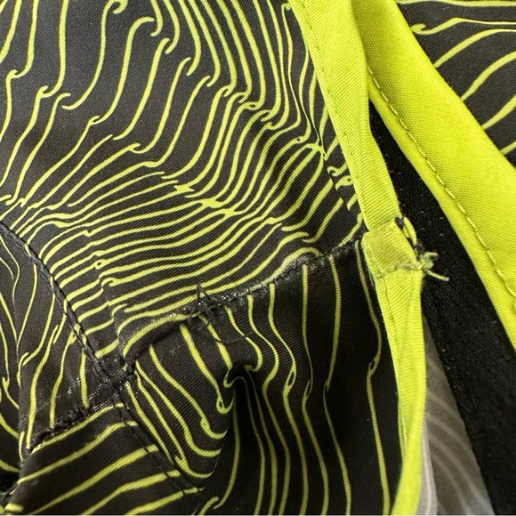 NIKE Women's DRI-FIT Dry Tempo Running Short - Volt Black - Medium - Picture 15 of 15